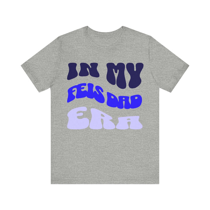 Feis Dad Era T-ShirtT-ShirtCotton,Crew neck,DTG,Feis Dad,Feis Dad Shirt,Feis Era,Men's Clothing,Neck Labels,Regular fit,T-shirts,TikTok,UnisexThis classic unisex jersey short sleeve tee fits like a well-loved favorite. Soft cotton and quality print make u