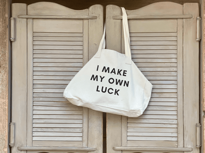 I Make my Own LuckToteI make my own luck,lucky bag,lucky toteExperience effortless style with our "I Make my Own Luck" canvas tote bag. Crafted with large, sturdy design and great quality, this tote is perfect for any occasion. Make a statement and carry