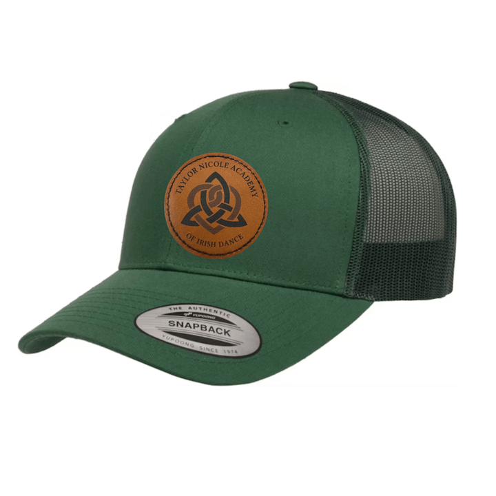 TNA Leather Patch HatBaseball HatBaseball Hat,Irish Dance Hat,Irish Dance School,Irish Dance School Hat,School collection,School Gear,School Hat,Taylor Nicole Academy,TNAGreen Snap Back with a faux leather patch Crafted with a green snap back and an engra