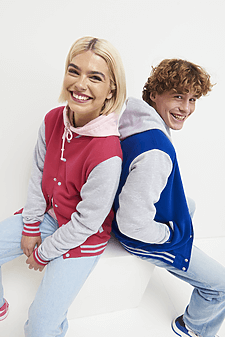 Youth wearing stylish custom varsity jackets, featuring premium cotton and polyester blend. Perfect mix of comfort and durability for all ages.